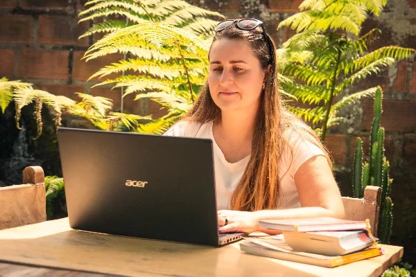 About language tutor Czech teacher Daniela Grunwald working on laptop